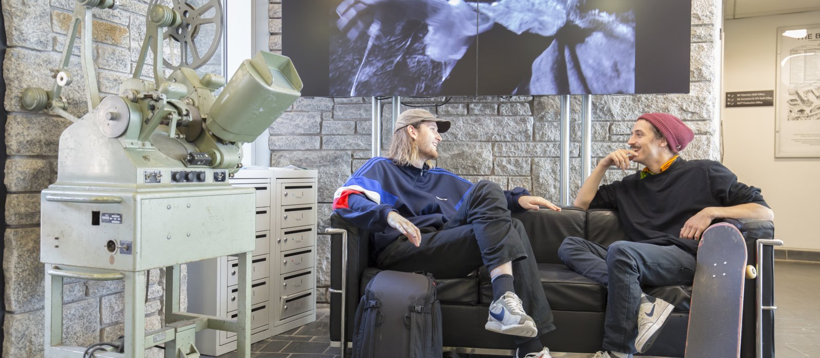 Two people discussing films at Falmouth University