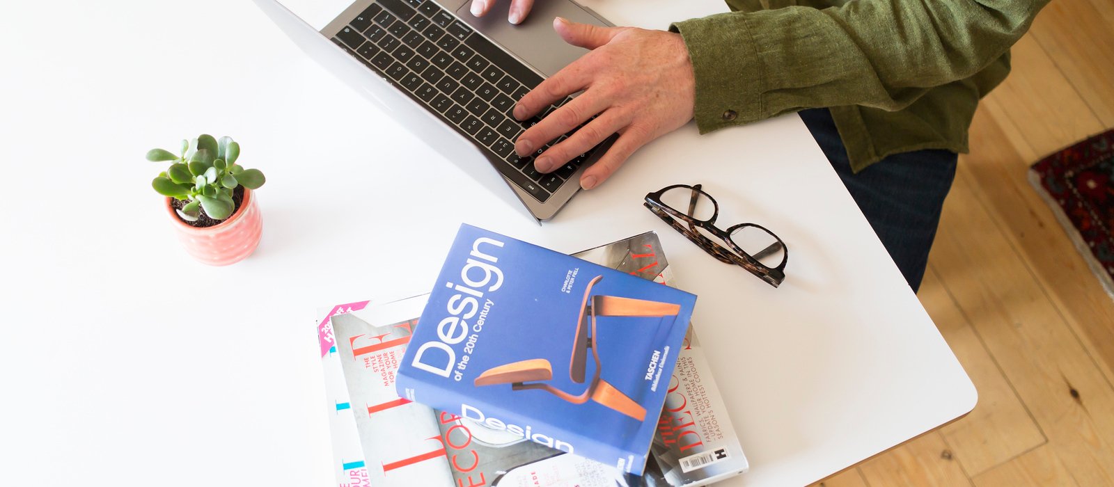 Interior Design online student working on laptop