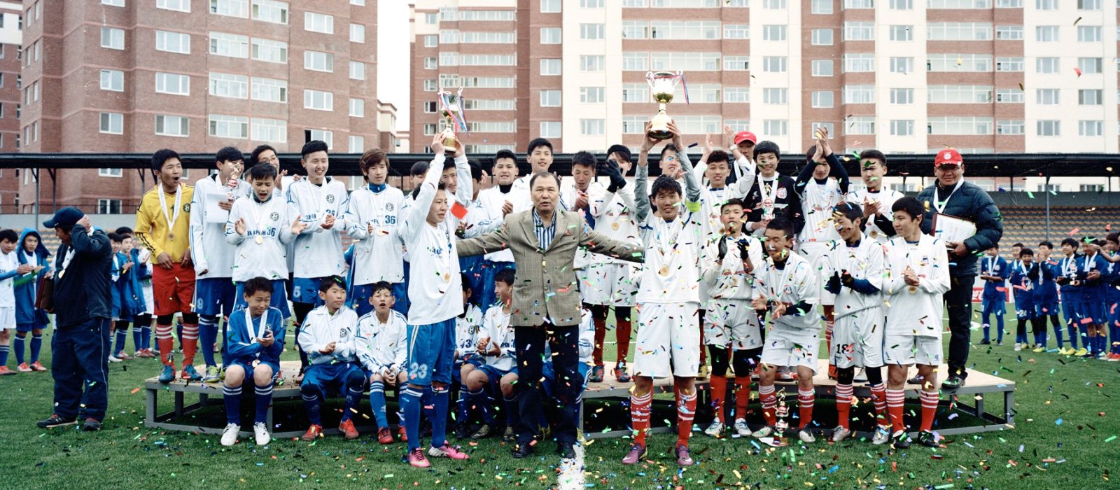 Press & Editorial Photography student work depicting Mongolian footballers celebrating success