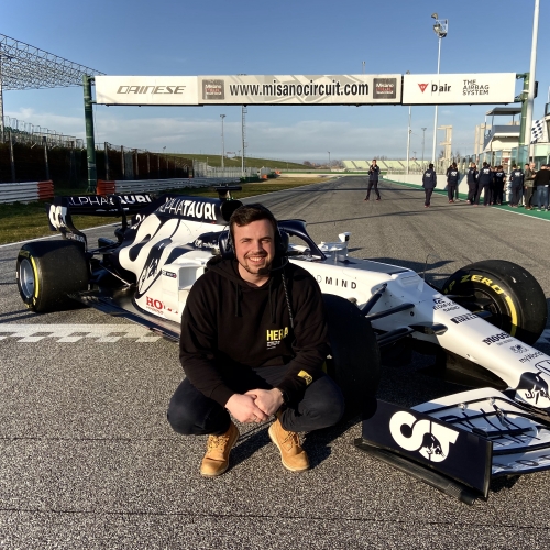 Elliott Harrison with Formula 1 car