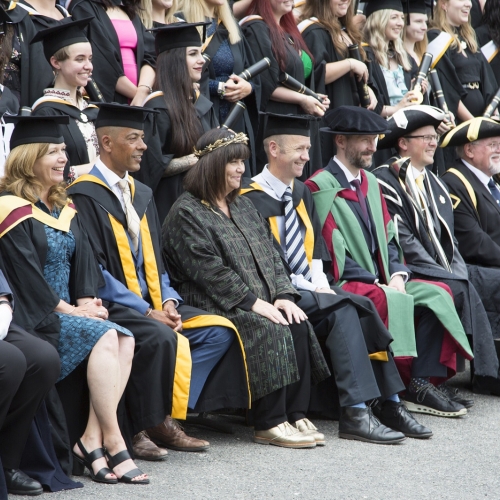 Staff, students and Dawn French at graduation