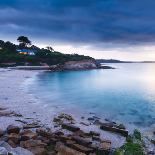 View of Swanpool beach at dusk
