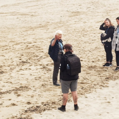 Sustainable Tourism Management students with tour guide on Portreath beach
