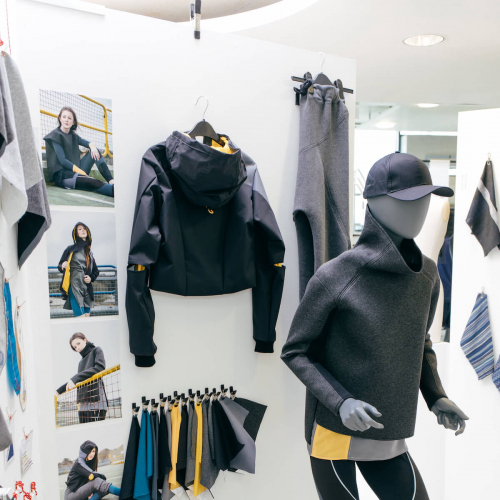 Sportswear designs with a mannequin wearing a baseball cap, jumper and leggins