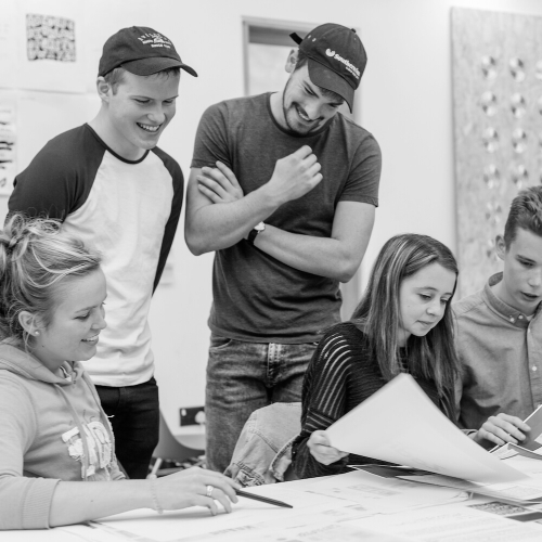 Students working in the Graphic Design Studio at Falmouth University