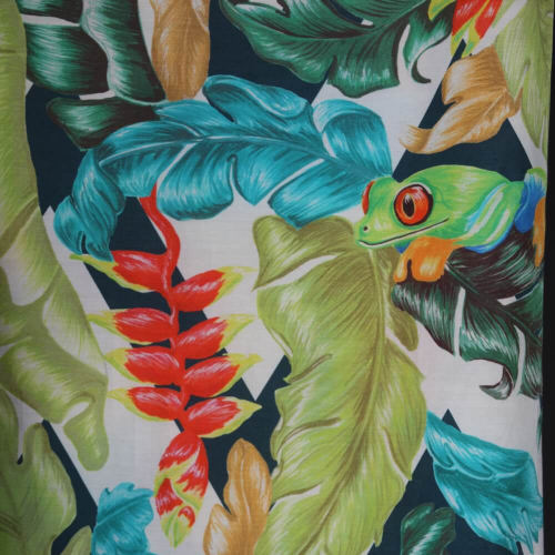 Tropical printed fabric with a red eyed frog.