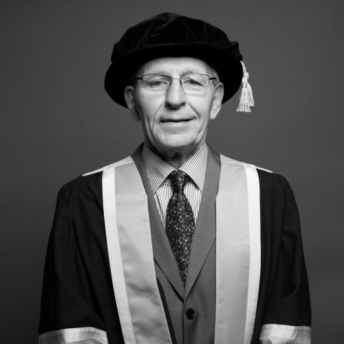 Falmouth honorary fellow Professor Alan Livingston CBE FCSD in academic gown.