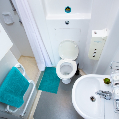 Ensuite bathroom with walk-in shower, heated towel rail, toilet and sink at Glasney Student Village 