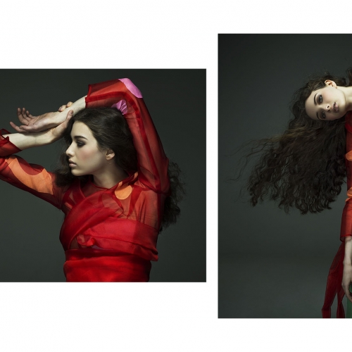 Double image of model wearing red silky dress with coloured abstract shapes.