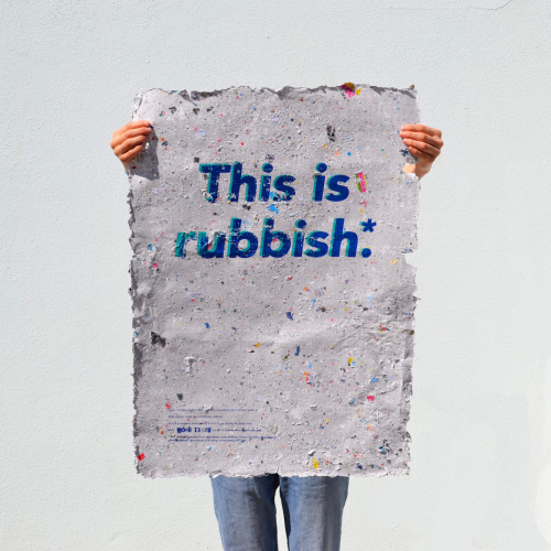 Recycled paper poster with the words This is Rubbish on.