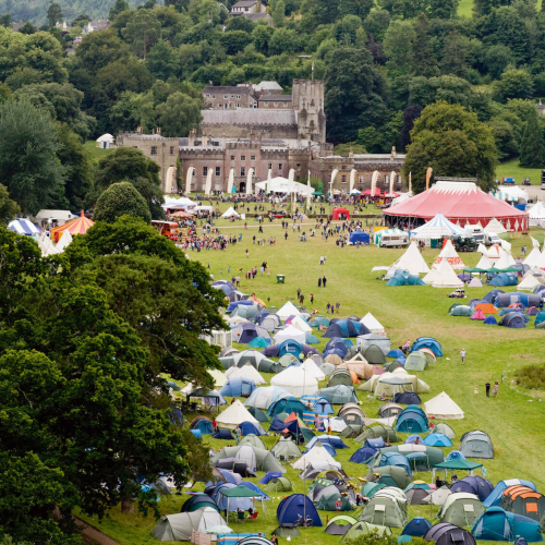 Port Eliot Festival with view of house, trees and tents